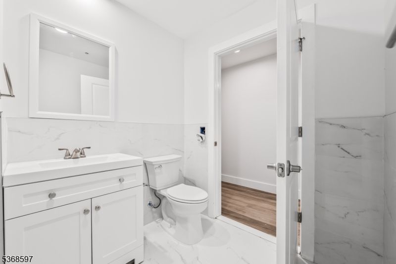Bathroom, Interior, Marble, Marble Walls, Recessed Lighting, Wood Texture Flooring
