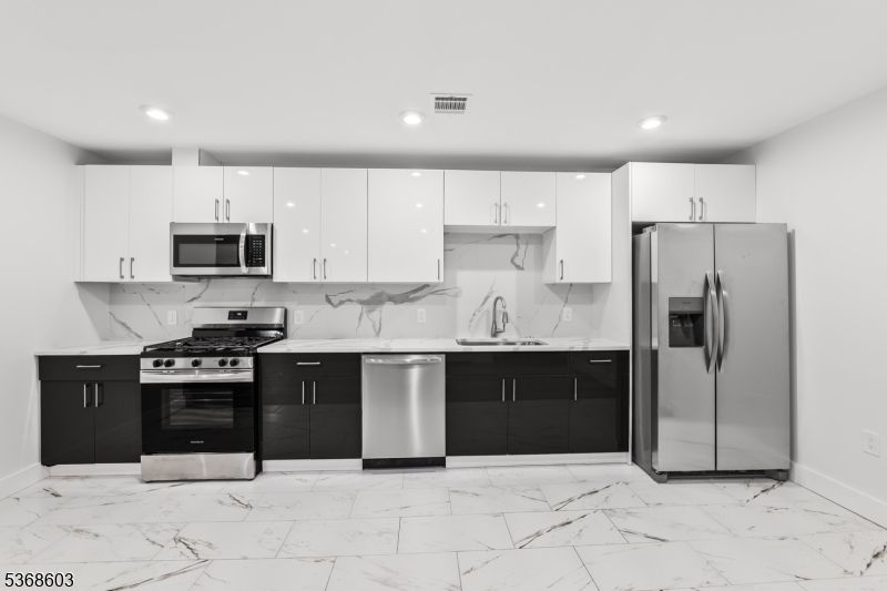 Interior, Kitchen, Marble, Marble Walls, Recessed Lighting, Stainless Steel Appliances