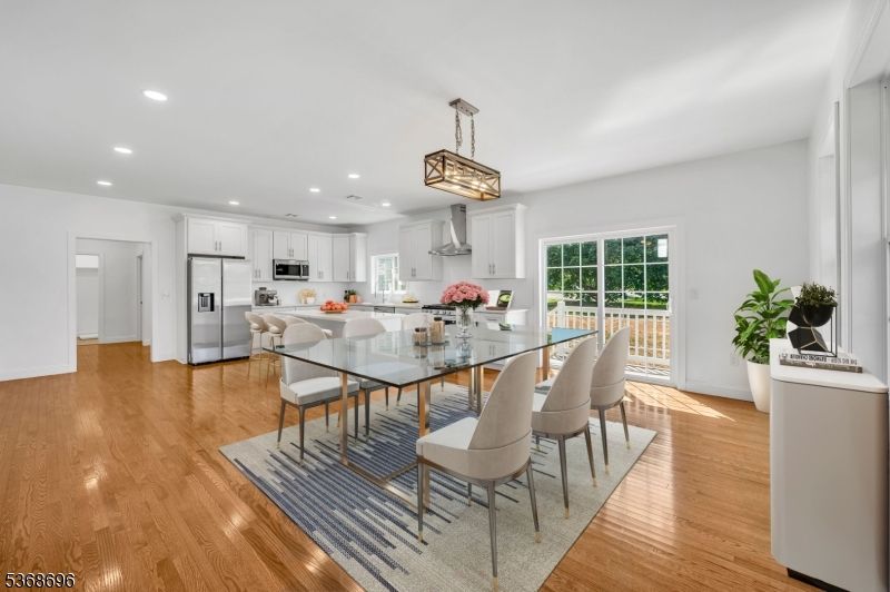 Dining room, Interior, Kitchen, Pendant Lights, Recessed Lighting, Stainless Steel Appliances, Wood Texture Flooring