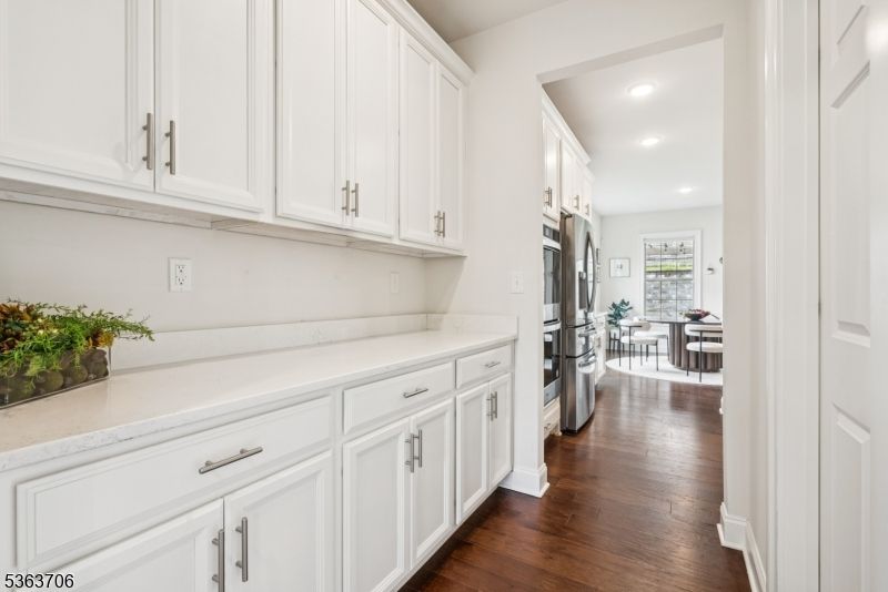 Interior, Kitchen, Recessed Lighting, Washer, Wood Texture Flooring