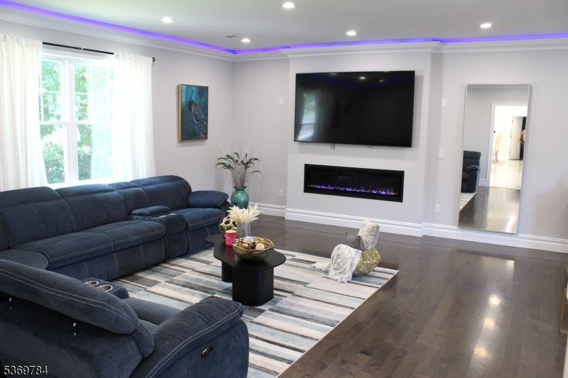 Fireplace, Interior, Living room, Recessed Lighting, Wood Texture Flooring