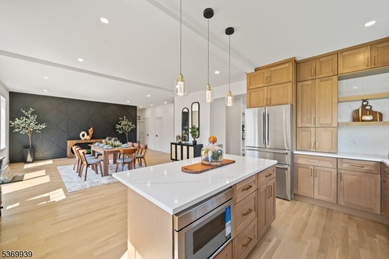 Dining room, Interior, Kitchen, Pendant Lights, Recessed Lighting, Stainless Steel Appliances, Wood Texture Flooring