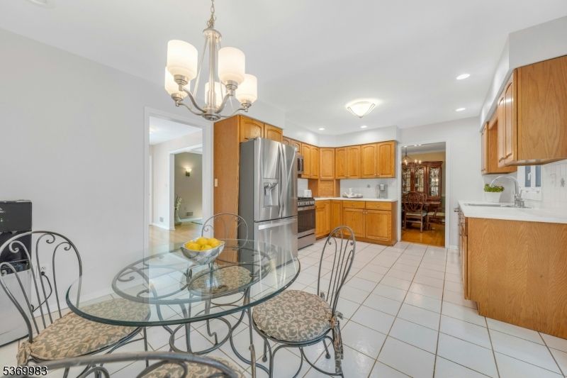 Chandelier, Dining room, Interior, Kitchen, Recessed Lighting, Stainless Steel Appliances