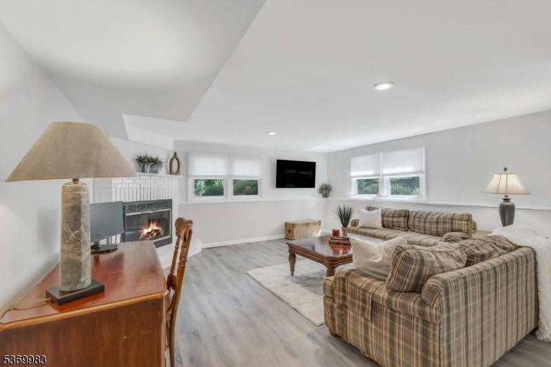 Fireplace, Interior, Living room, Recessed Lighting, Wood Texture Flooring