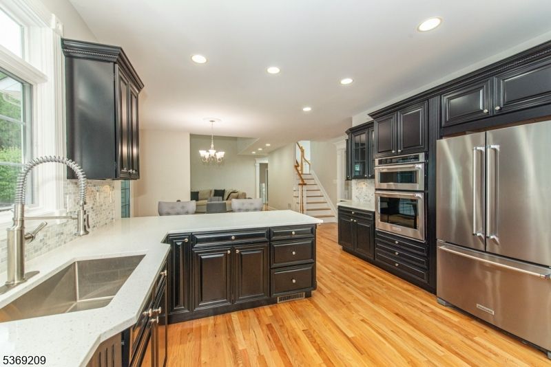Chandelier, Interior, Kitchen, Recessed Lighting, Stainless Steel Appliances, Wood Texture Flooring