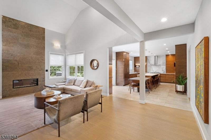 Dining room, Fireplace, Interior, Kitchen, Living room, Pendant Lights, Recessed Lighting, Stone Walls, Wood Texture Flooring