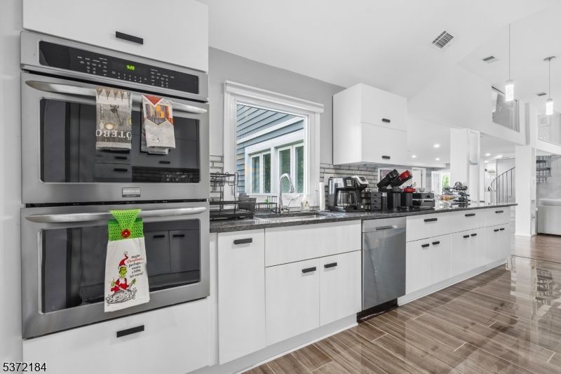 Interior, Kitchen, Pendant Lights, Recessed Lighting, Stainless Steel Appliances, Wood Texture Flooring