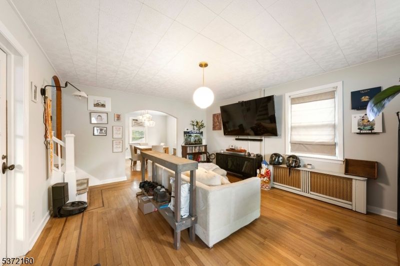 Dining room, Interior, Living room, Pendant Lights, Wood Texture Flooring