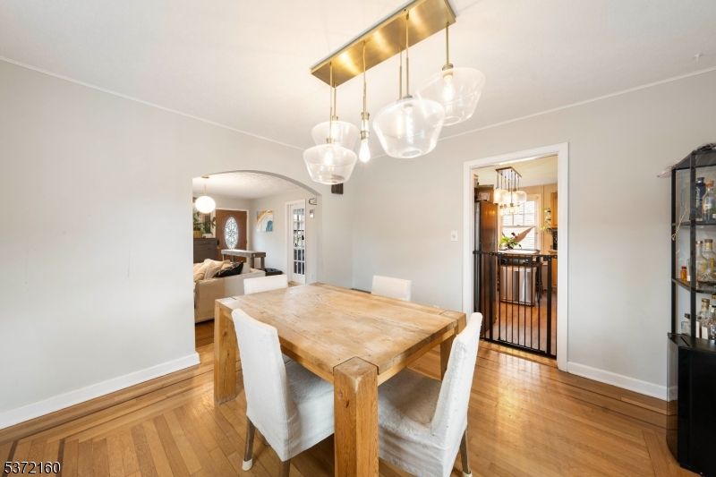 Dining room, Interior, Living room, Pendant Lights, Wood Texture Flooring