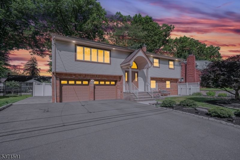 Attached, Exterior, Facade, Raised Ranch