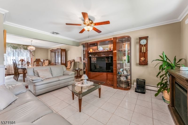Chandelier, Dining room, Fireplace, Interior, Living room