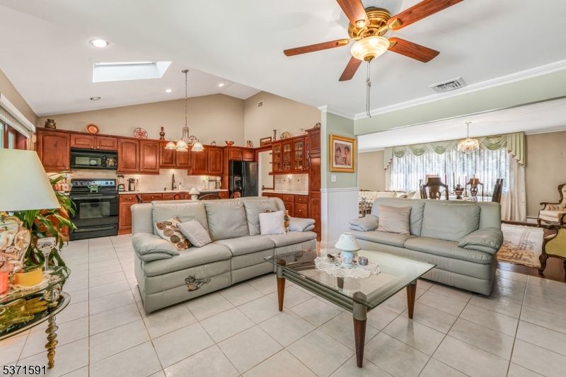 Chandelier, Dining room, Interior, Kitchen, Living room, Pendant Lights, Recessed Lighting, Stainless Steel Appliances