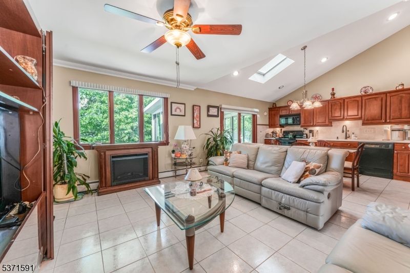 Fireplace, Interior, Kitchen, Living room, Pendant Lights, Recessed Lighting, Stainless Steel Appliances