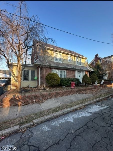 Exterior, Facade, Brick Facade, Cape Cod
