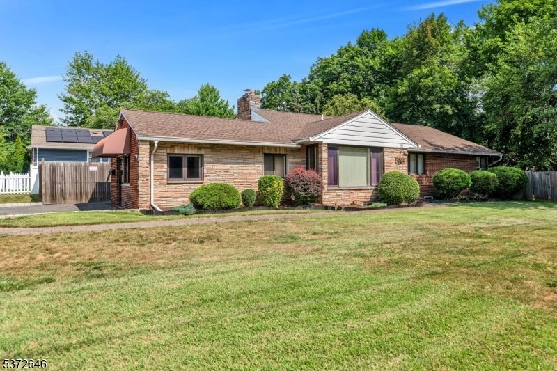 Backyard, Exterior, Facade, Brick Facade, Solar Panels, Ranch