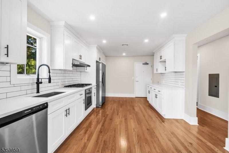 Interior, Kitchen, Recessed Lighting, Stainless Steel Appliances, Wood Texture Flooring