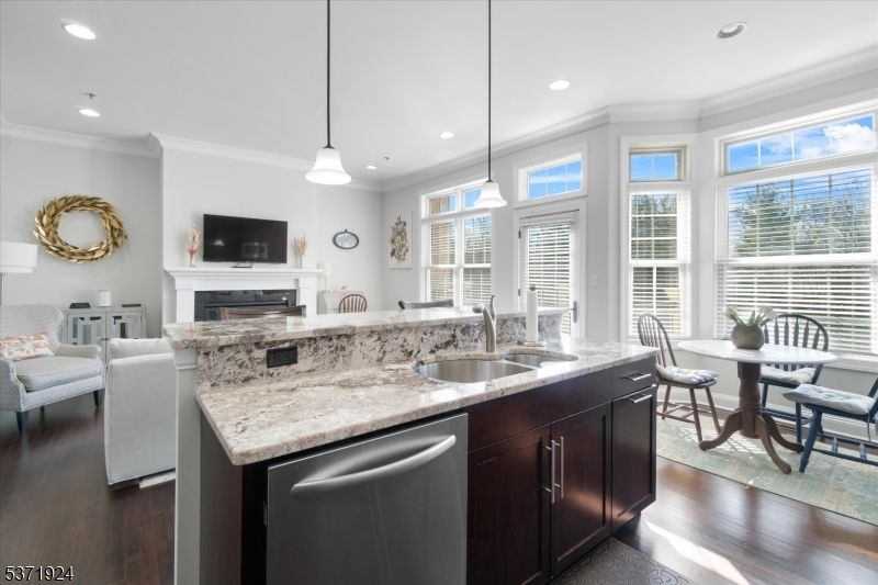 Dining room, Fireplace, Interior, Kitchen, Pendant Lights, Recessed Lighting, Wood Texture Flooring