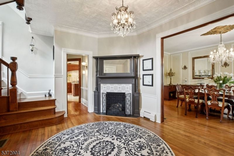 Chandelier, Dining room, Fireplace, Interior, Wood Texture Flooring