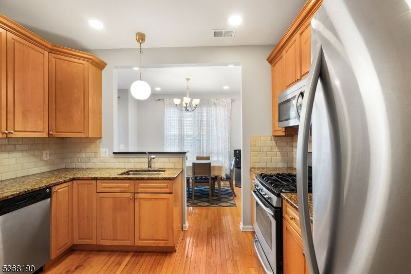 Chandelier, Dining room, Interior, Kitchen, Pendant Lights, Recessed Lighting, Wood Texture Flooring