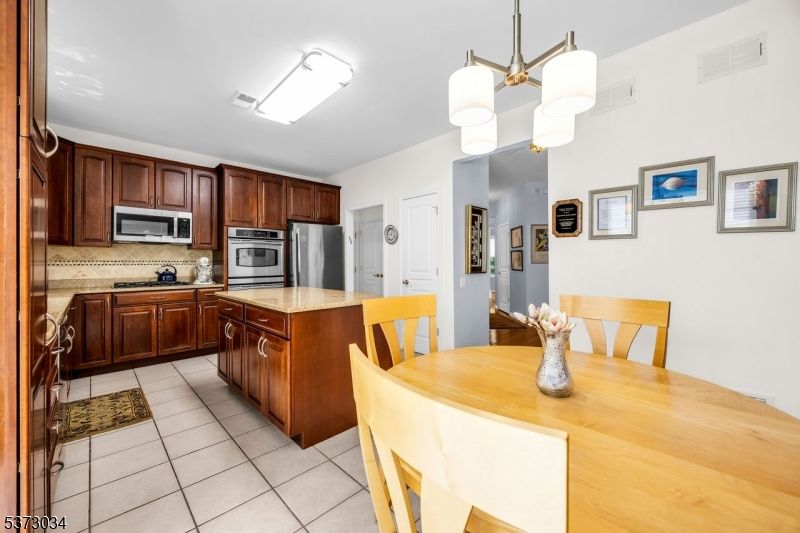 Dining room, Interior, Kitchen, Pendant Lights, Stainless Steel Appliances