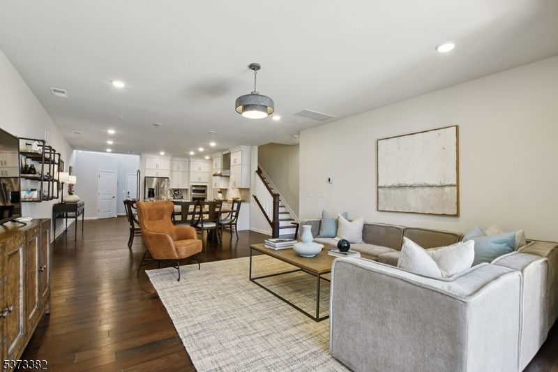 Dining room, Interior, Kitchen, Living room, Pendant Lights, Recessed Lighting, Stainless Steel Appliances, Wood Texture Flooring
