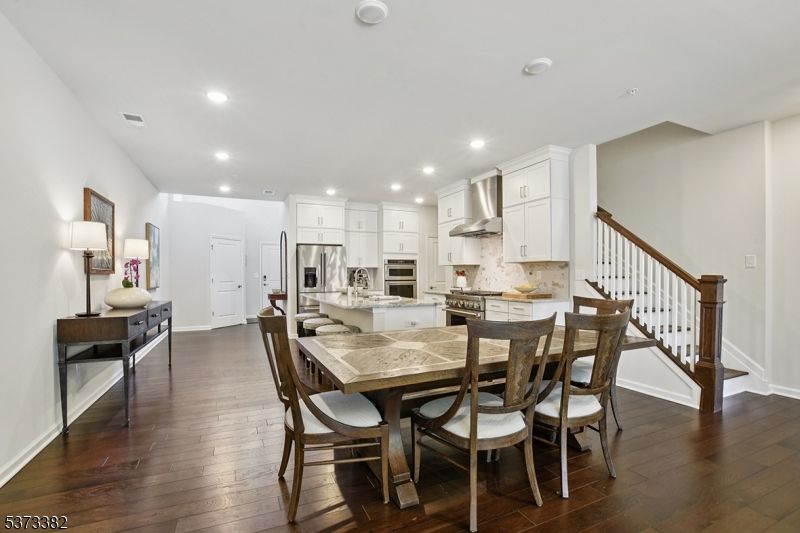 Dining room, Interior, Kitchen, Recessed Lighting, Stainless Steel Appliances, Wood Texture Flooring