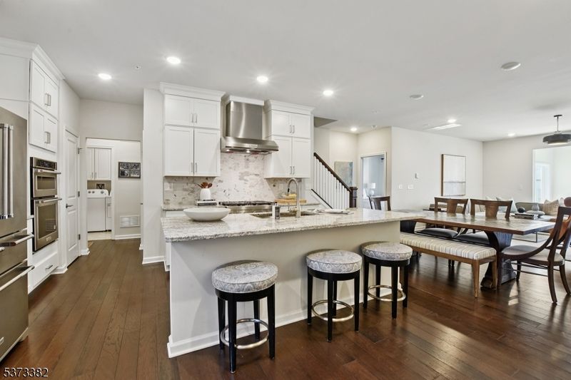 Dining room, Interior, Kitchen, Recessed Lighting, Stainless Steel Appliances, Wood Texture Flooring