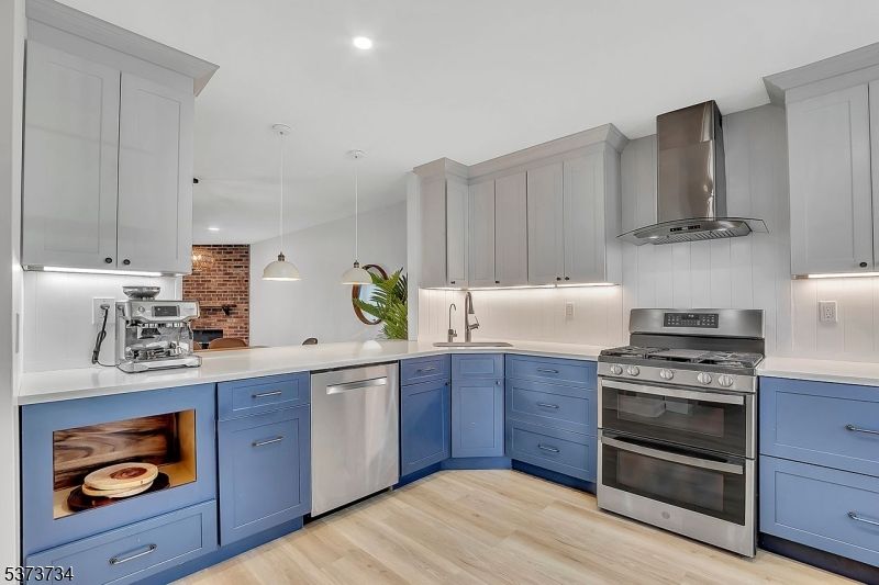 Interior, Kitchen, Pendant Lights, Recessed Lighting, Stainless Steel Appliances, Wood Texture Flooring
