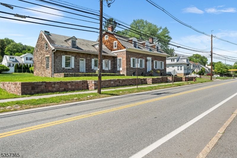 Exterior, Facade, Brick Facade, Cape Cod