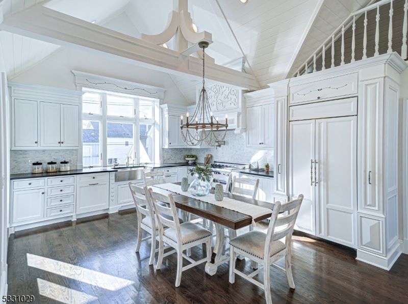 Chandelier, Dining room, Interior, Kitchen, Recessed Lighting, Stainless Steel Appliances, Wood Texture Flooring