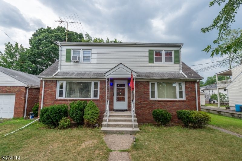 Attached, Exterior, Facade, Brick Facade, Cape Cod