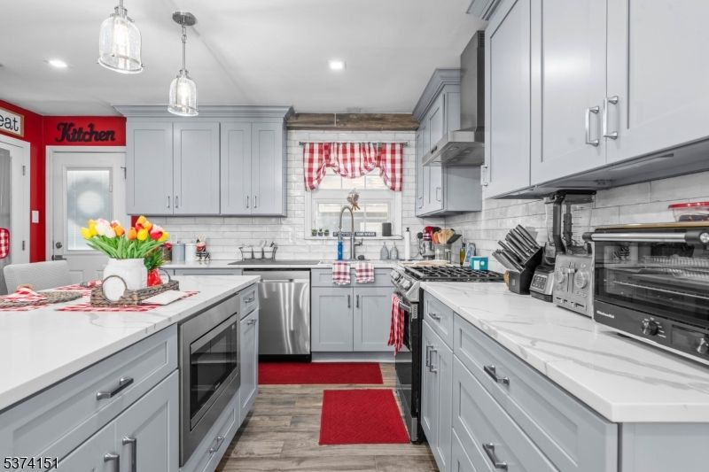 Interior, Kitchen, Pendant Lights, Recessed Lighting, Stainless Steel Appliances, Wood Texture Flooring
