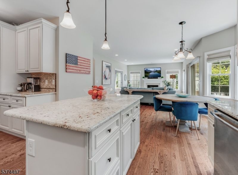 Dining room, Fireplace, Interior, Kitchen, Pendant Lights, Recessed Lighting, Wood Texture Flooring