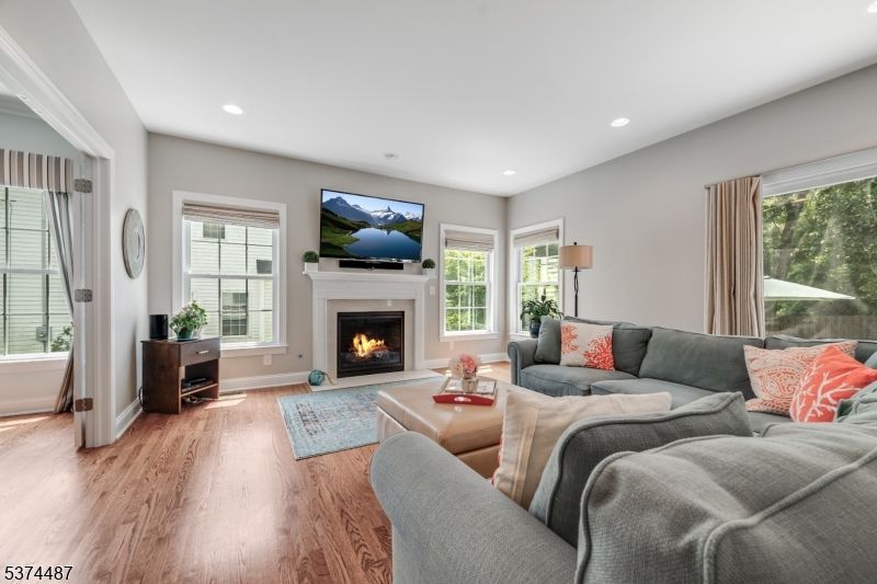 Fireplace, Interior, Living room, Recessed Lighting, Wood Texture Flooring