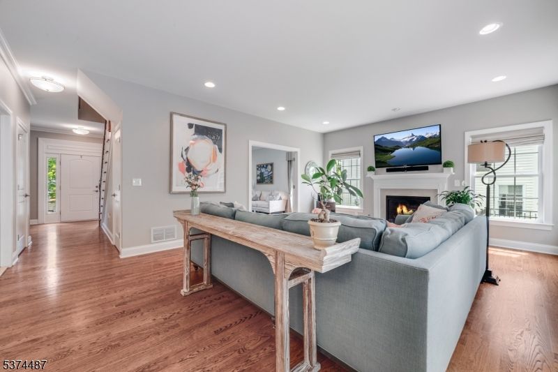 Fireplace, Interior, Living room, Recessed Lighting, Wood Texture Flooring