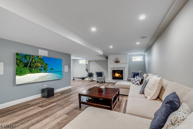 Fireplace, Interior, Living room, Recessed Lighting, Wood Texture Flooring