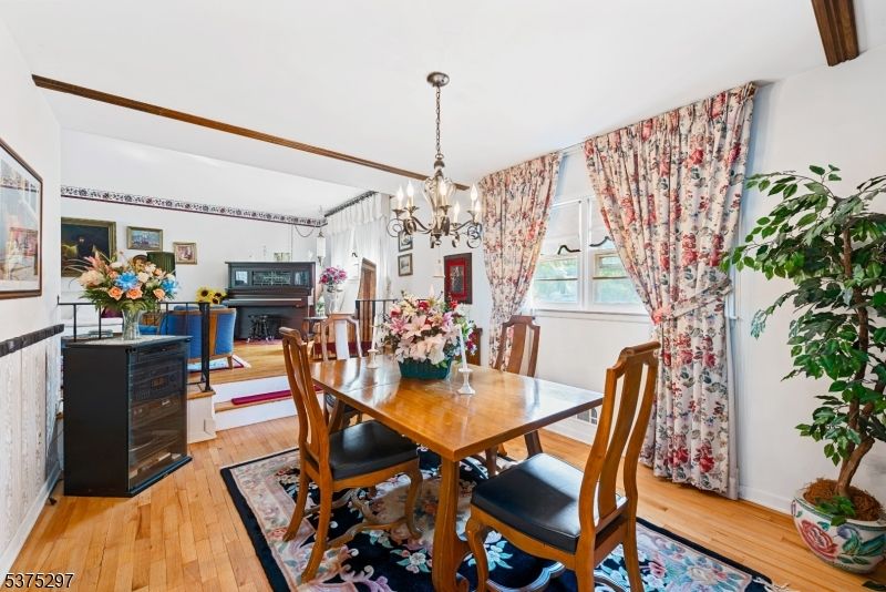 Chandelier, Dining room, Interior, Piano, Wood Texture Flooring
