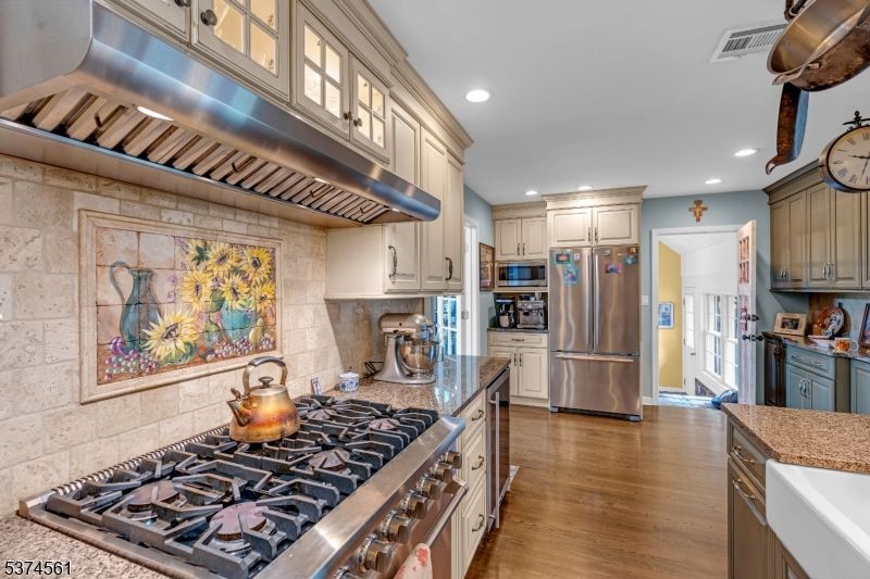Interior, Kitchen, Recessed Lighting, Stainless Steel Appliances, Stone Walls, Wood Texture Flooring