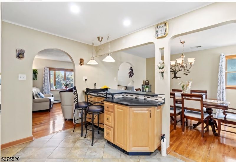Chandelier, Dining room, Interior, Living room, Pendant Lights, Recessed Lighting, Wood Texture Flooring
