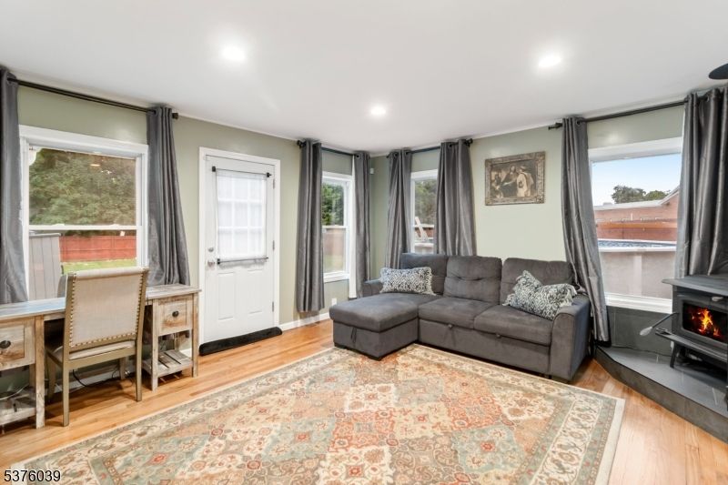 Fireplace, Home Office, Interior, Recessed Lighting, Wood Texture Flooring
