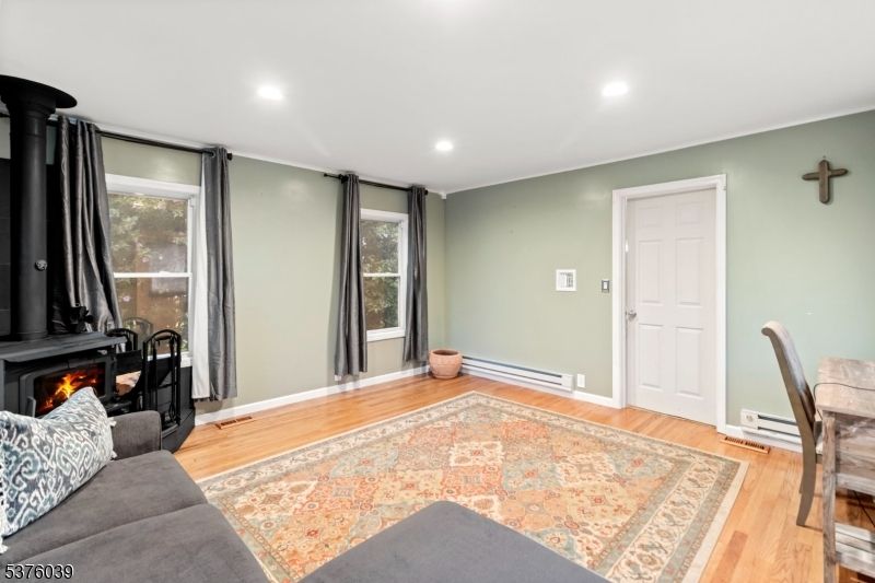 Fireplace, Interior, Recessed Lighting, Wood Texture Flooring