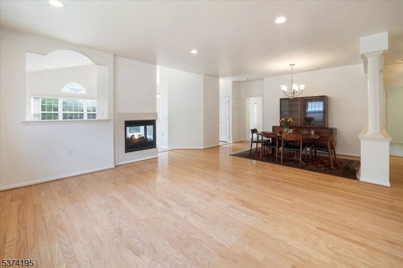 Chandelier, Dining room, Fireplace, Interior, Recessed Lighting, Wood Texture Flooring