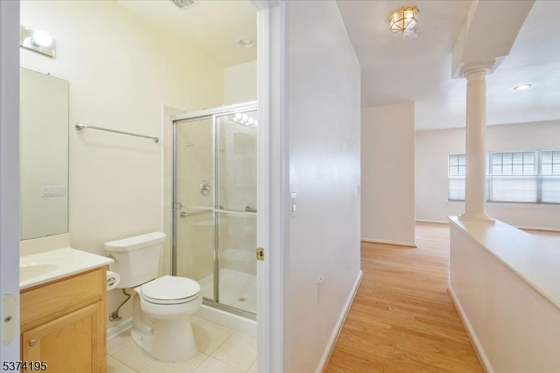 Bathroom, Glass Shower, Interior, Recessed Lighting, Wood Texture Flooring