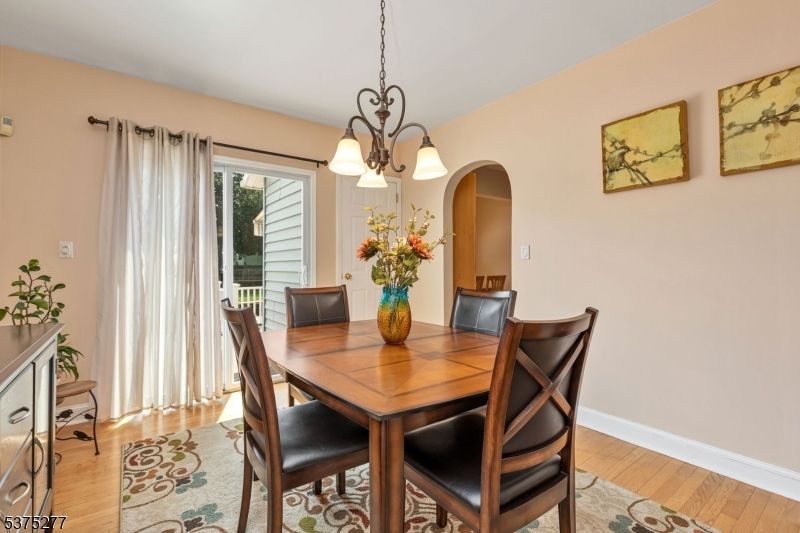 Chandelier, Dining room, Interior, Pendant Lights, Wood Texture Flooring