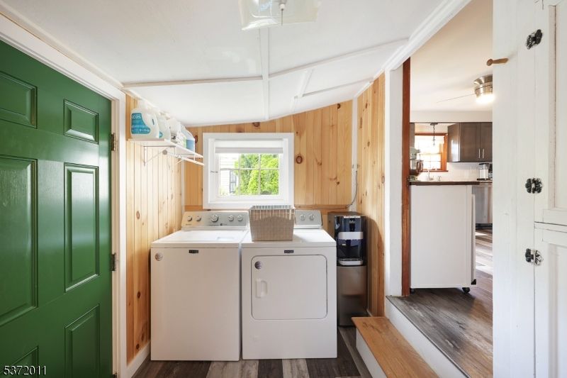 Interior, Utility Closets, Washer, Wood Texture Flooring, Wooden Walls