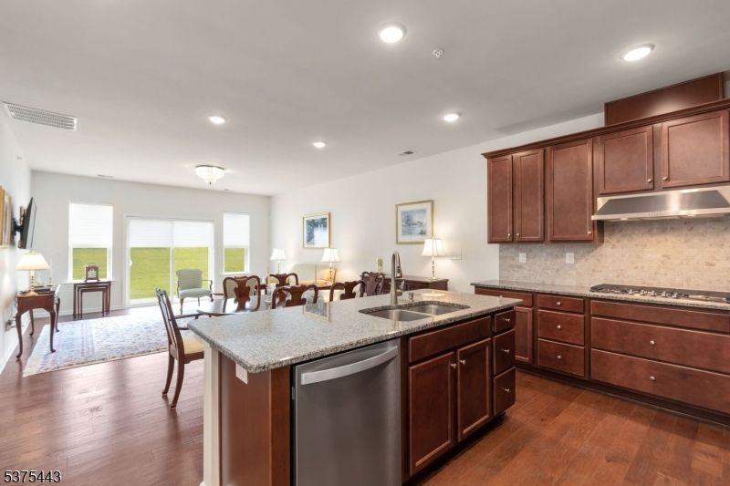 Dining room, Interior, Kitchen, Recessed Lighting, Stainless Steel Appliances, Wood Texture Flooring
