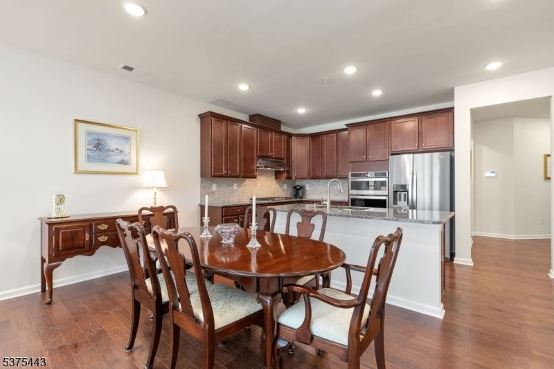 Dining room, Interior, Kitchen, Recessed Lighting, Stainless Steel Appliances, Wood Texture Flooring