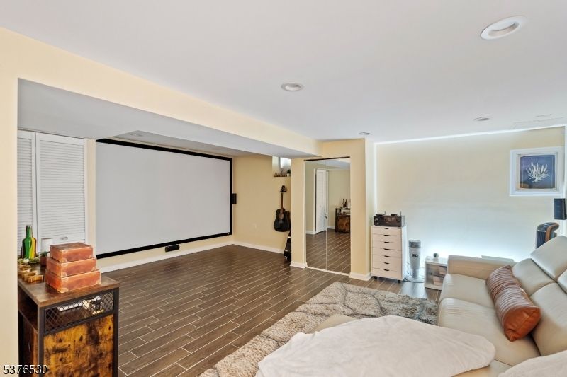 Interior, Living room, Projection Screen, Recessed Lighting, Wood Texture Flooring