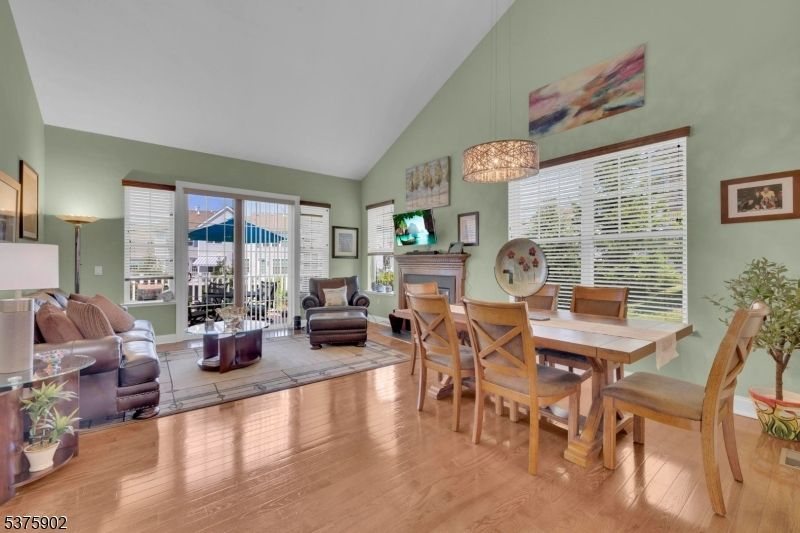 Dining room, Fireplace, Interior, Living room, Pendant Lights, Wood Texture Flooring