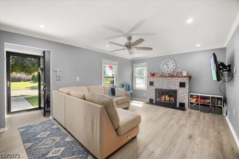 Fireplace, Interior, Living room, Recessed Lighting, Wood Texture Flooring